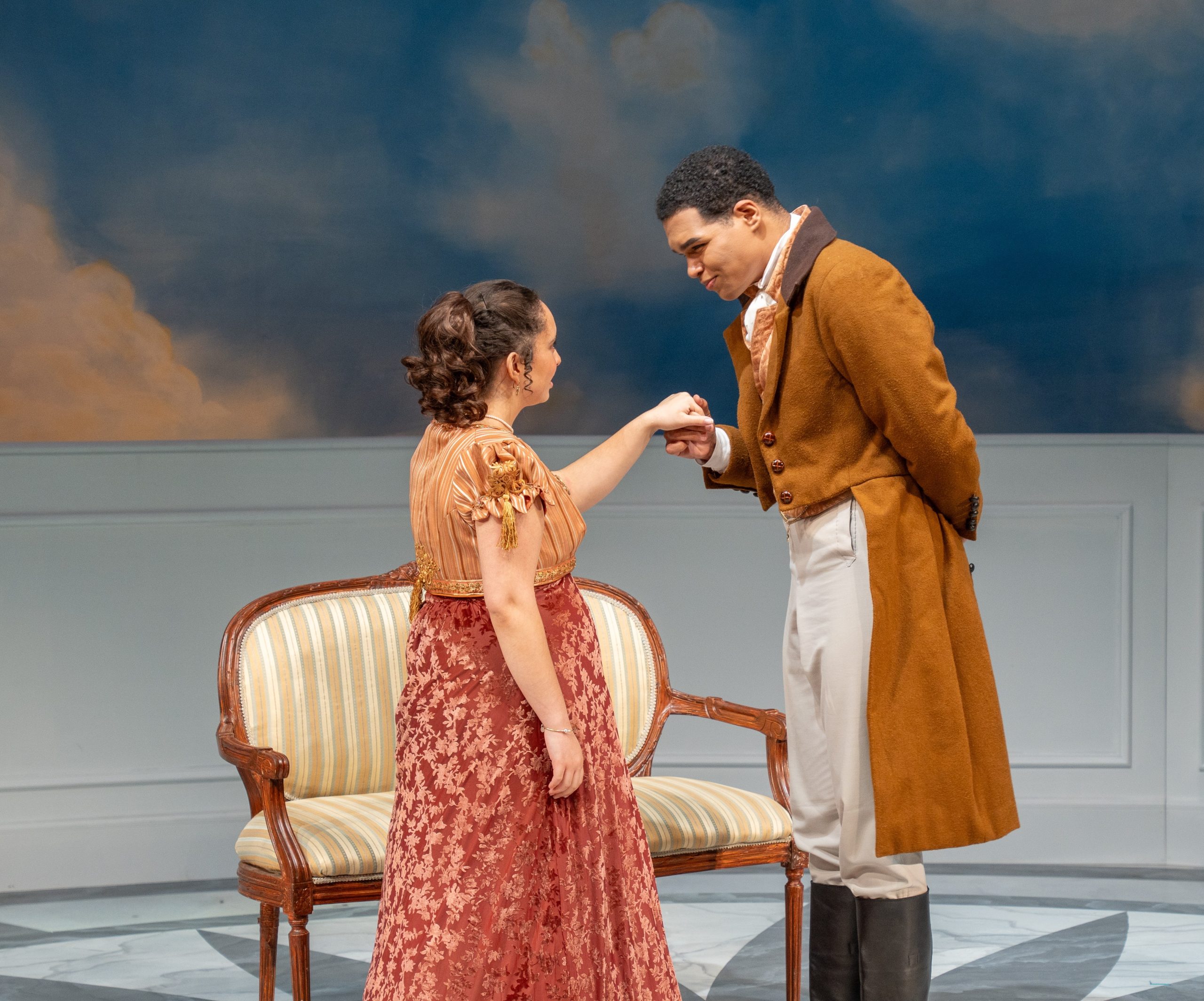 Photo from play PRIDE & PREJUDICE of a man holding a woman's hand.